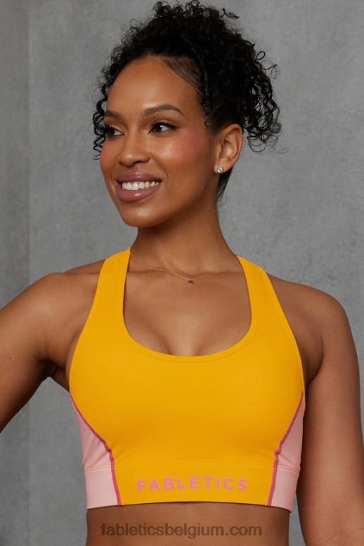 middagzon/roze botercreme vrouwen medium impact sportbeha voor onderweg 111 Fabletics LH20J1738