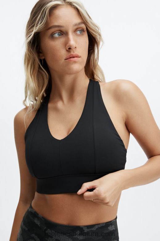 zwart logo vrouwen midi medium impact sportbeha voor onderweg 130 Fabletics LH20J1836